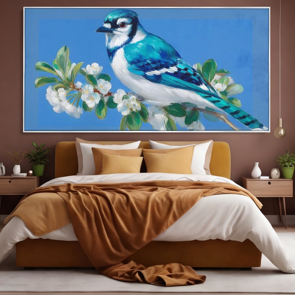 Tablou canvas cu tablou canvas cu gai albastra pe ramura, in rama de aluminiu argintiu, pe perete intr-un dormitor